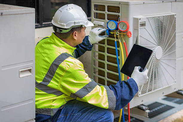 Professional Hvac technician working in Columbiana, AL